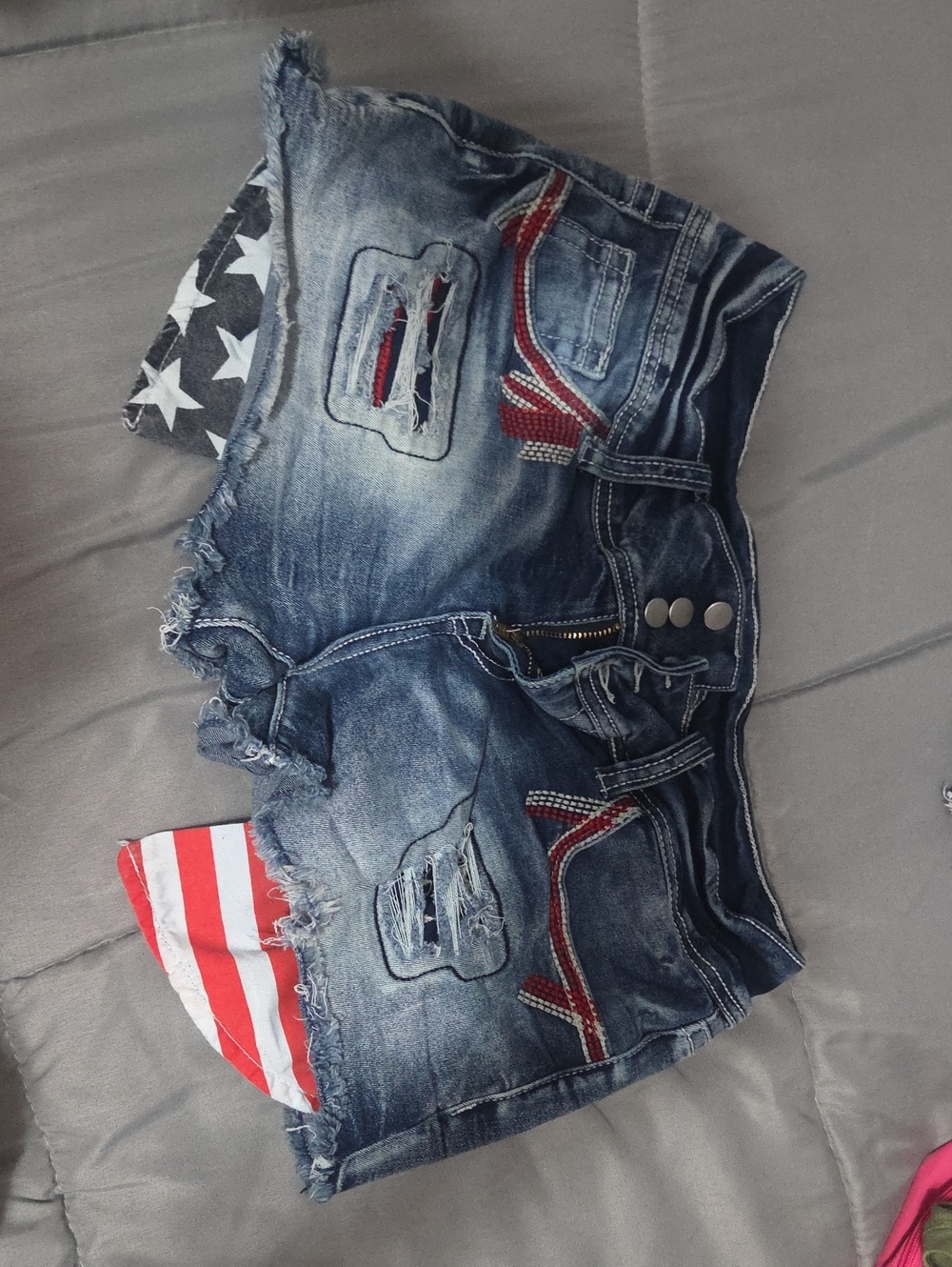 Frayed Distressed Blue Denim Shorts with Flag Accent